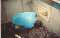 larry caulking an evaporative cooler